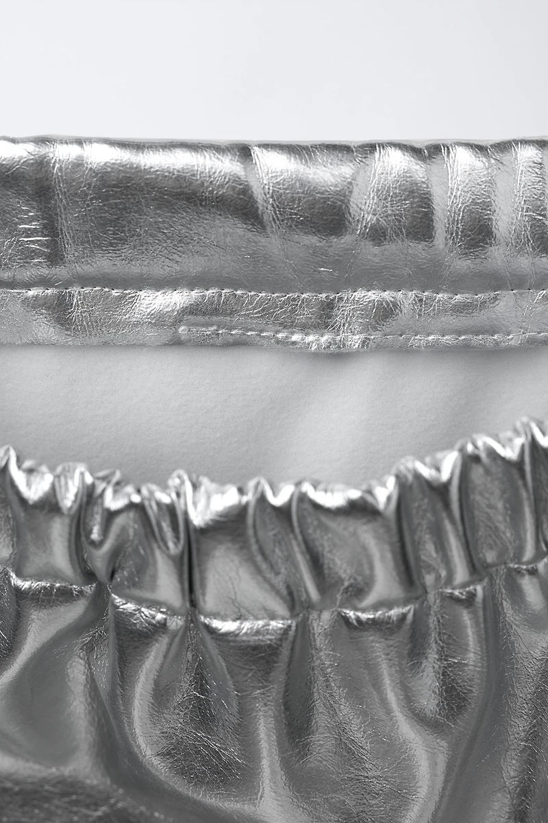 JUPE MÉTALLISÉE AVEC LACETS