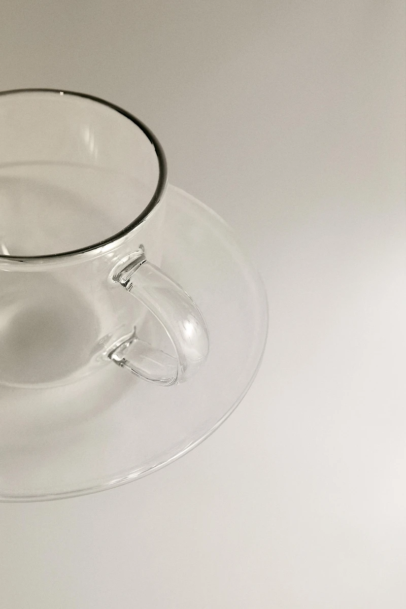 BOROSILICATE GLASS TEA CUP AND SAUCER WITH SILVER RIM