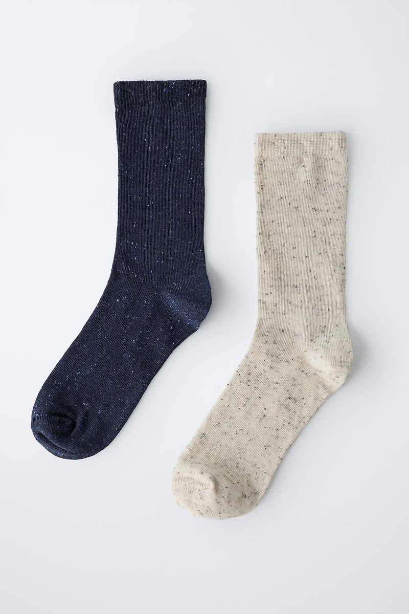 TWO-PACK OF LONG BUTTON-PRINT SOCKS
