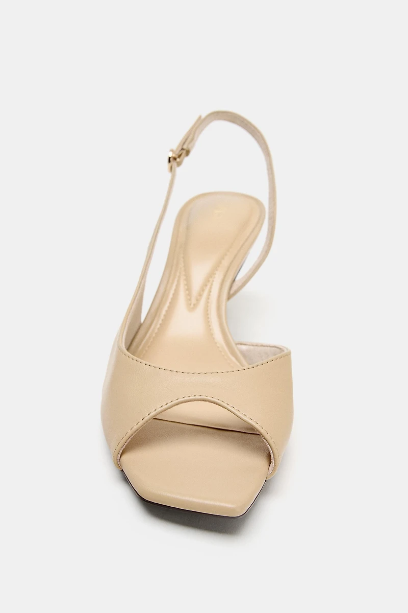 ASYMMETRIC HEELED SANDALS