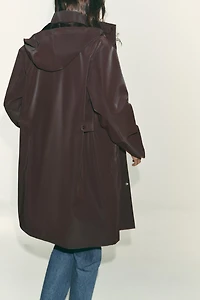 VESTE ENDUITE À CAPUCHE COUPE-VENT