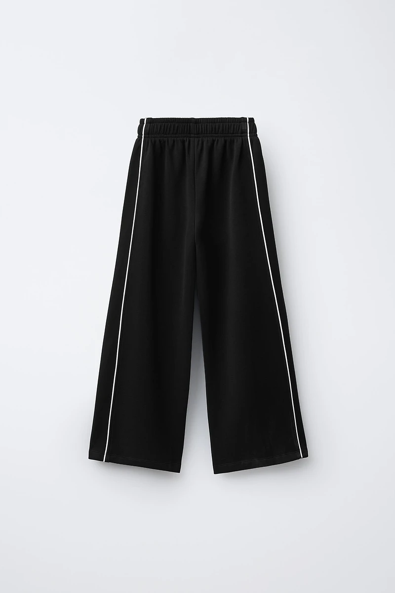 MODAL PANTS WITH CONTRASTING PIPING