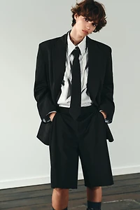 PLEATED LONG SHORTS