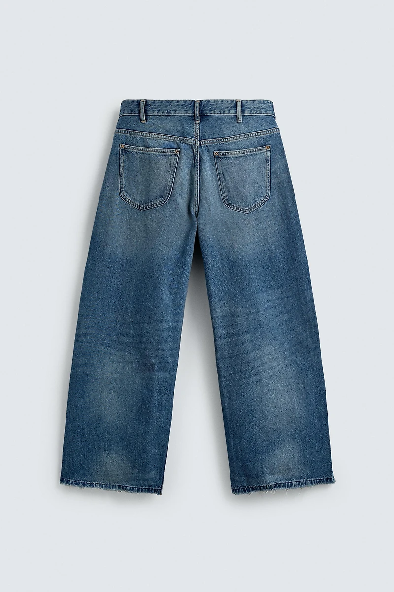 RELAXED FIT RIPPED JEANS