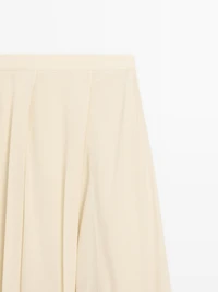 Flowing midi skirt with ruffles