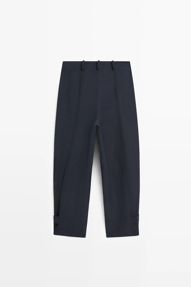 Flowing linen blend pants with buttoned tab detail