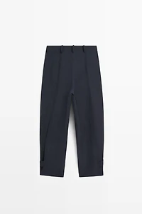 Flowing linen blend pants with buttoned tab detail