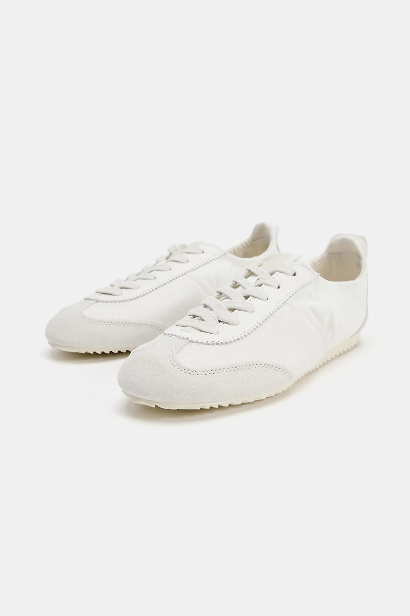BASKETS SPORTIVES TALON ÉLASTIQUE