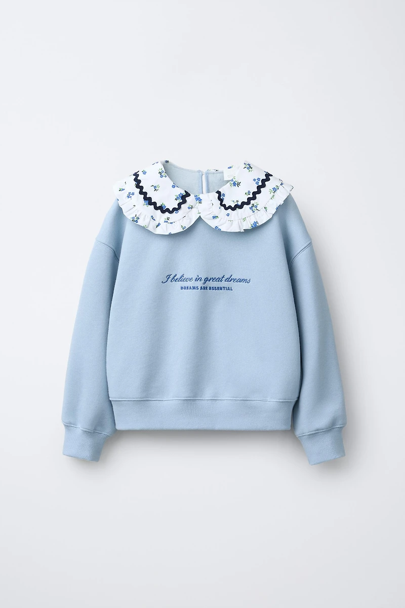 SWEATSHIRT WITH RUFFLED NECK AND EMBROIDERED TEXT