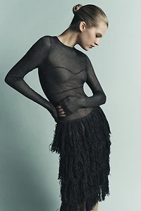 ROBE EN MAILLE FIL MÉTALLISÉ FRANGES