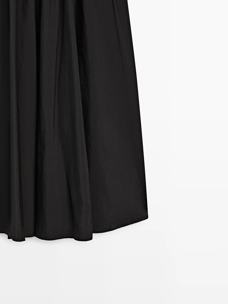 Jupe midi en tissu technique