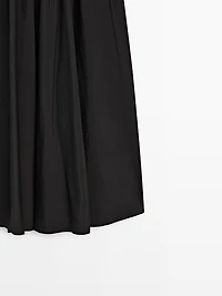 Jupe midi en tissu technique