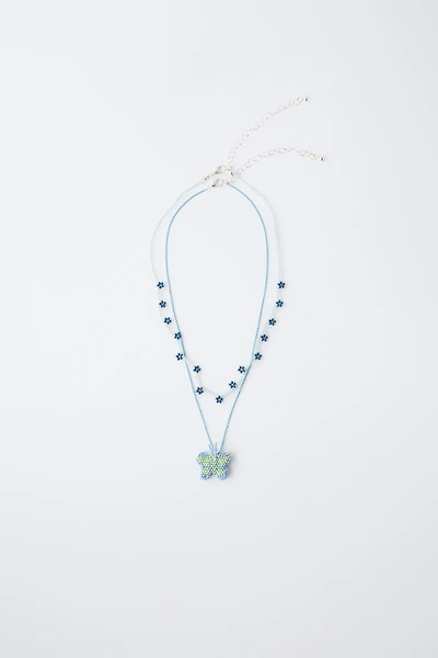 PACK OF TWO BUTTERFLY AND FLOWER BEADED NECKLACES