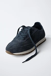 BASKETS EN CUIR