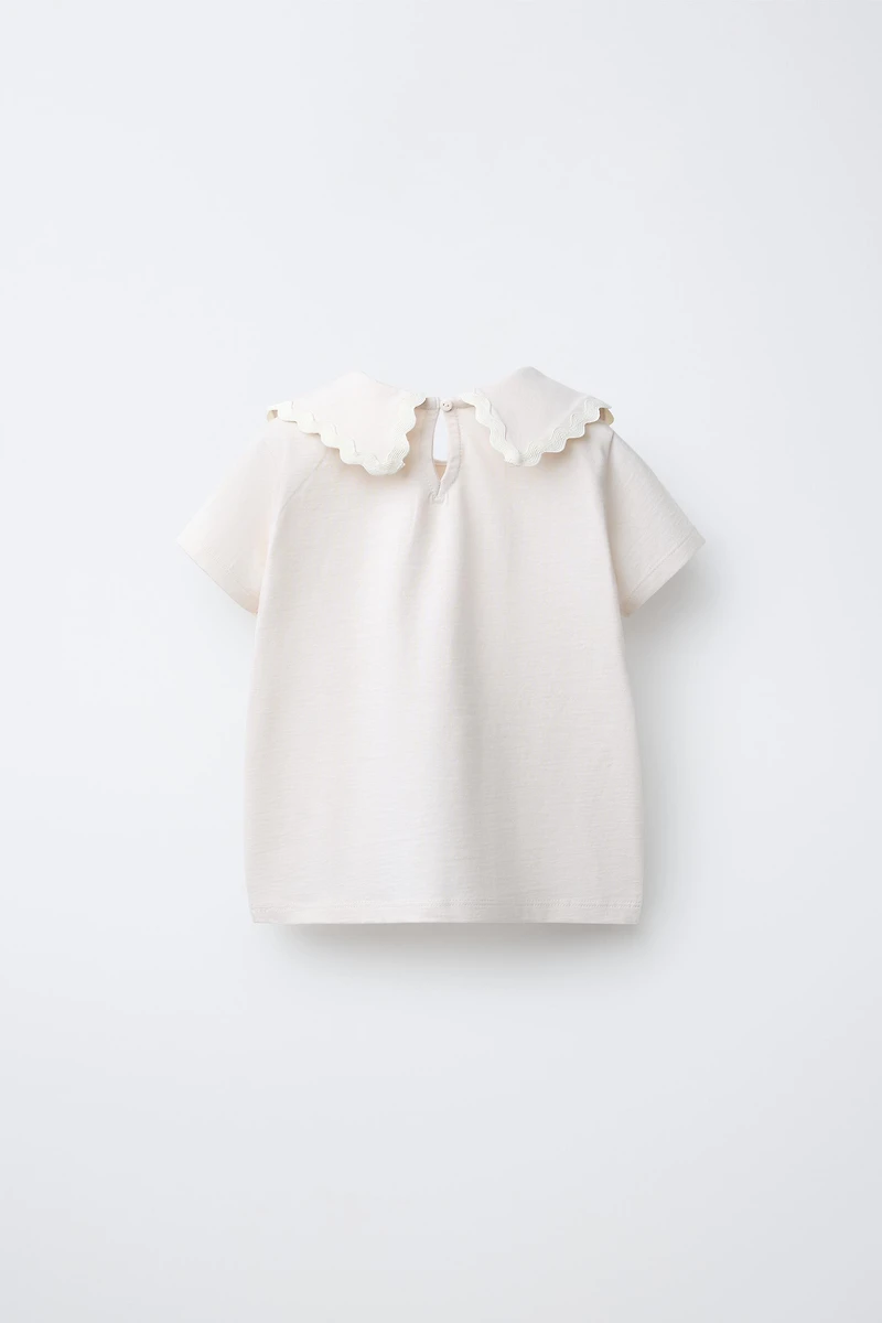 PETER PAN COLLAR TOP WITH RIPPLE TRIM