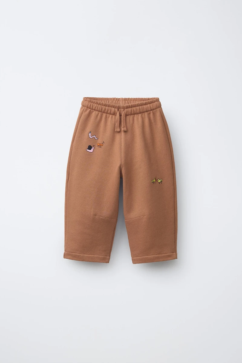 EMBROIDERED ANIMAL PLUSH PANTS