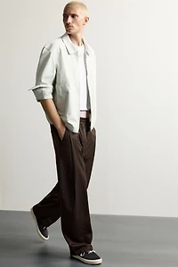 SIDE-PLEAT BALLOON FIT PANTS