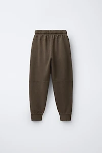 SLIM FIT PANTS WITH ZIPPERS