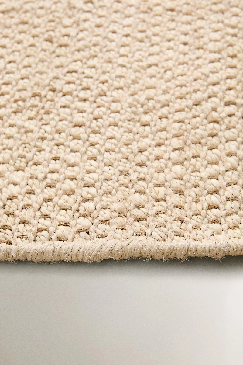 WOVEN JUTE AREA RUG
