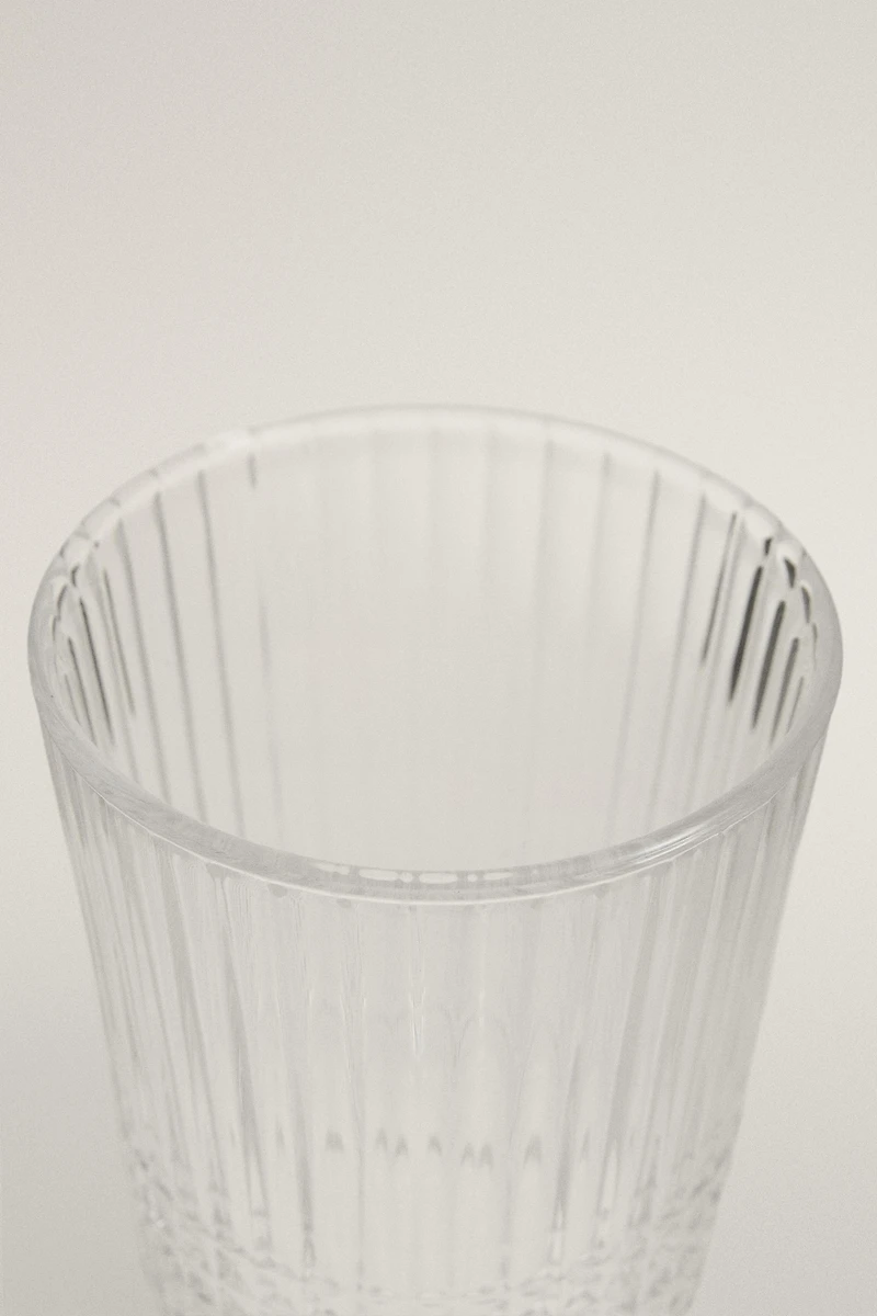 GLASS TUMBLER WITH RAISED GEOMETRIC DESIGN