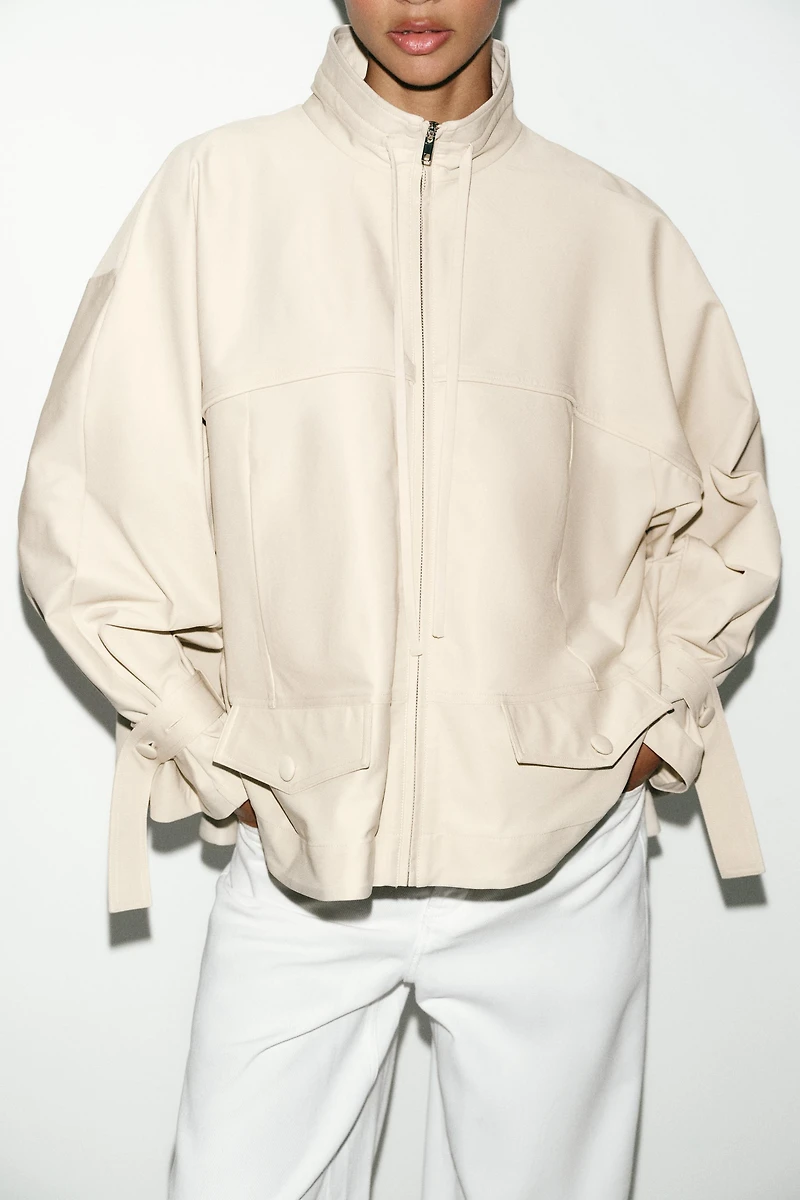 FLUID HIGH NECK JACKET