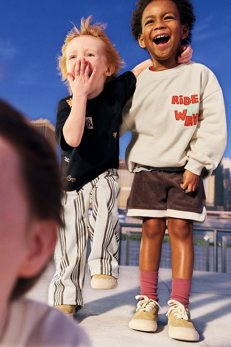 TERRYCLOTH EFFECT SHORTS WITH LABEL
