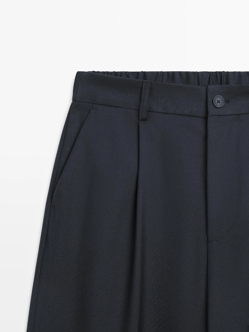 Relaxed fit wool blend trousers with darts