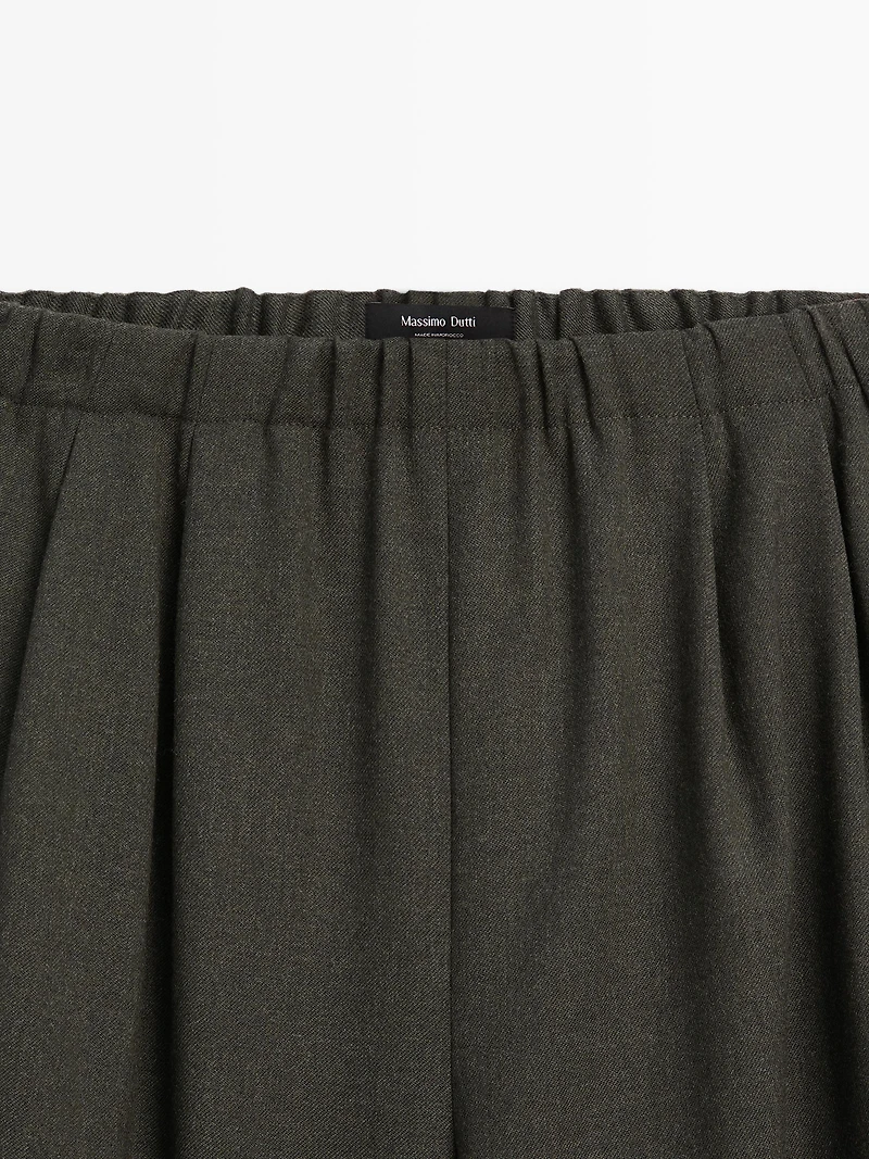 Wide-leg trousers with darts and elasticated waistband