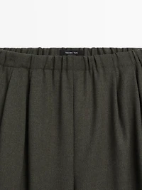 Wide-leg trousers with darts and elasticated waistband