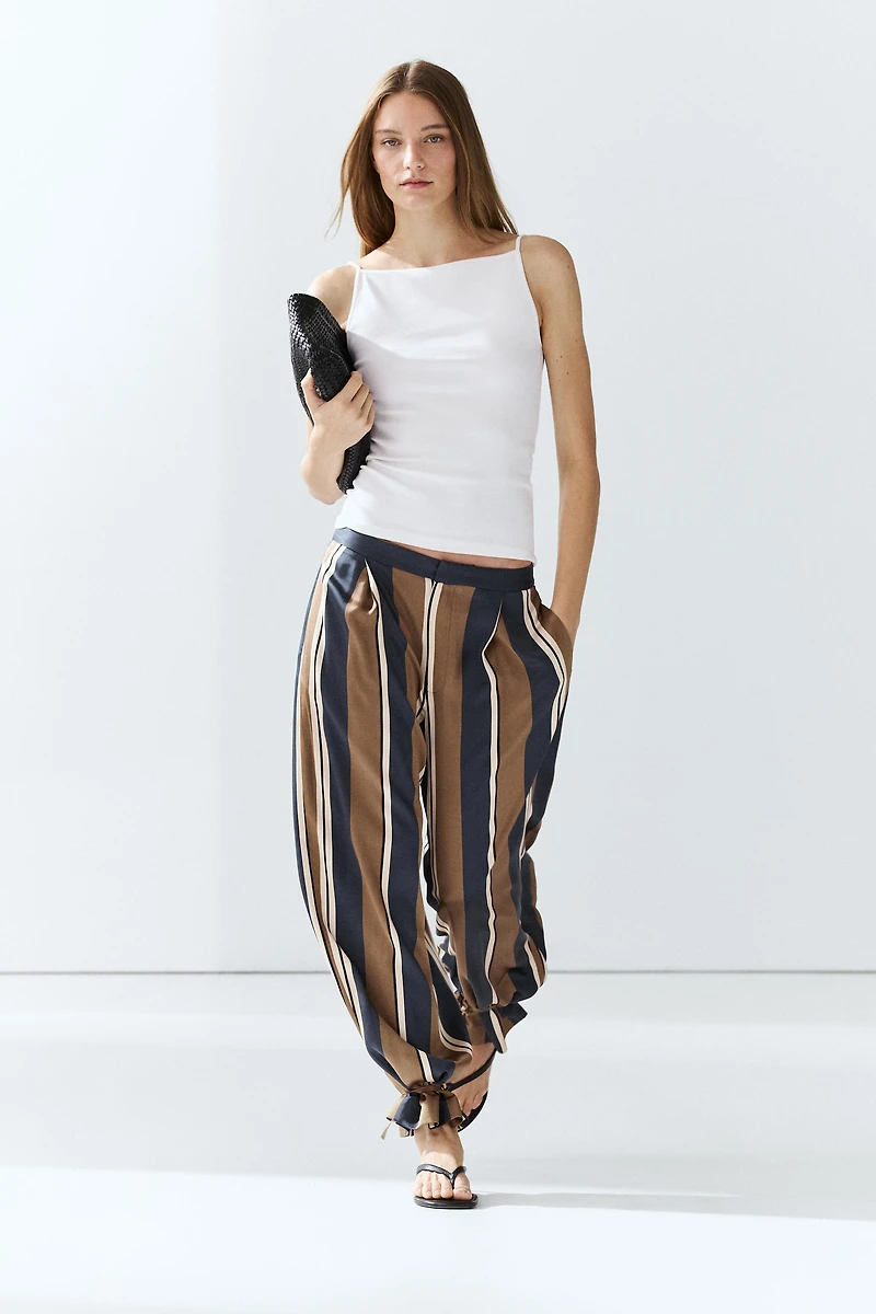 Satin pants with tie-up hem detail