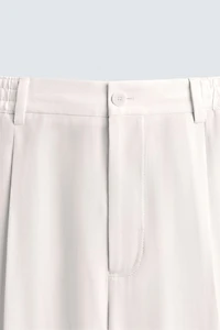 PANTALON COUPE DÉCONTRACTÉE PLIS