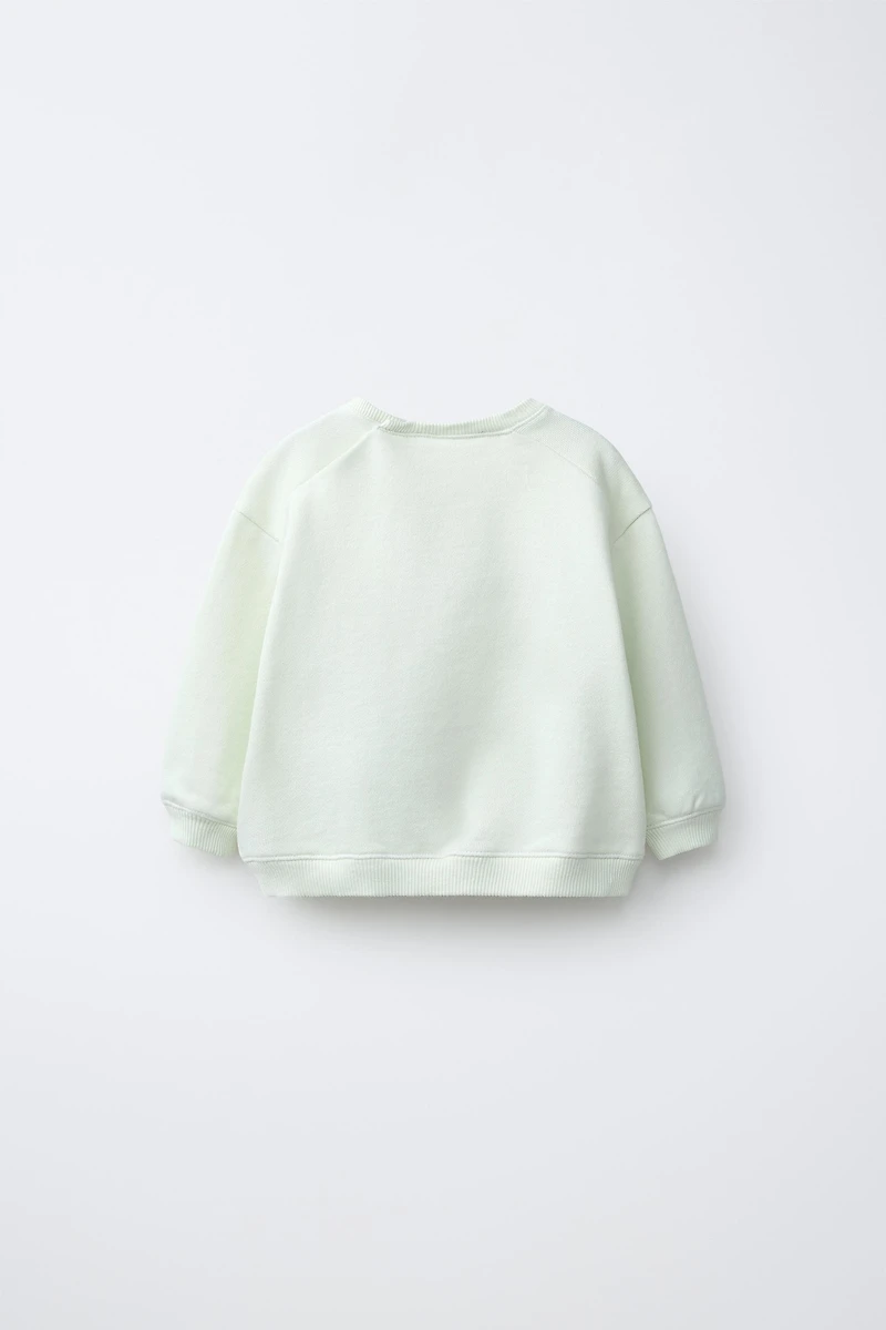 EMBROIDERED CHICK SWEATSHIRT