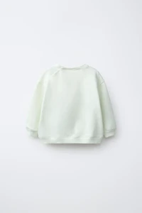 EMBROIDERED CHICK SWEATSHIRT