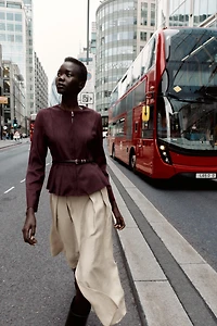 VESTE PEPLUM EFFET DAIM CEINTURÉE