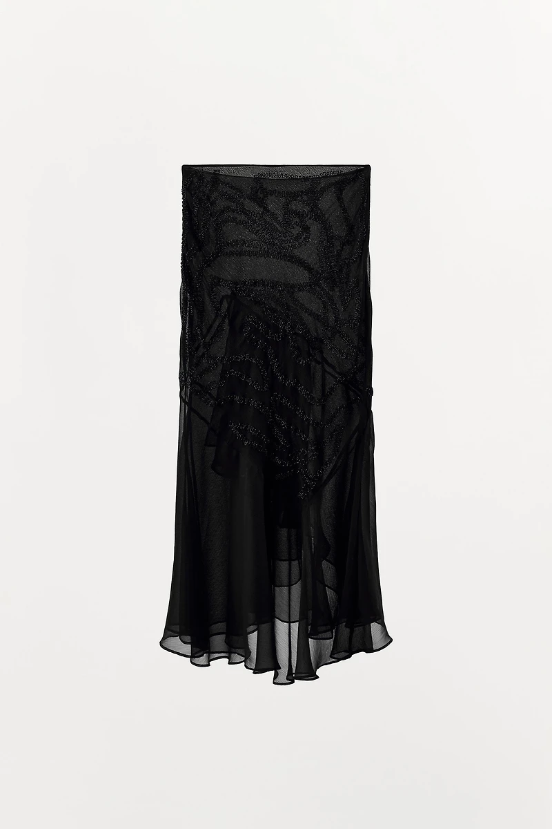 JUPE MI-LONGUE À VOLANTS ET FANTAISIE