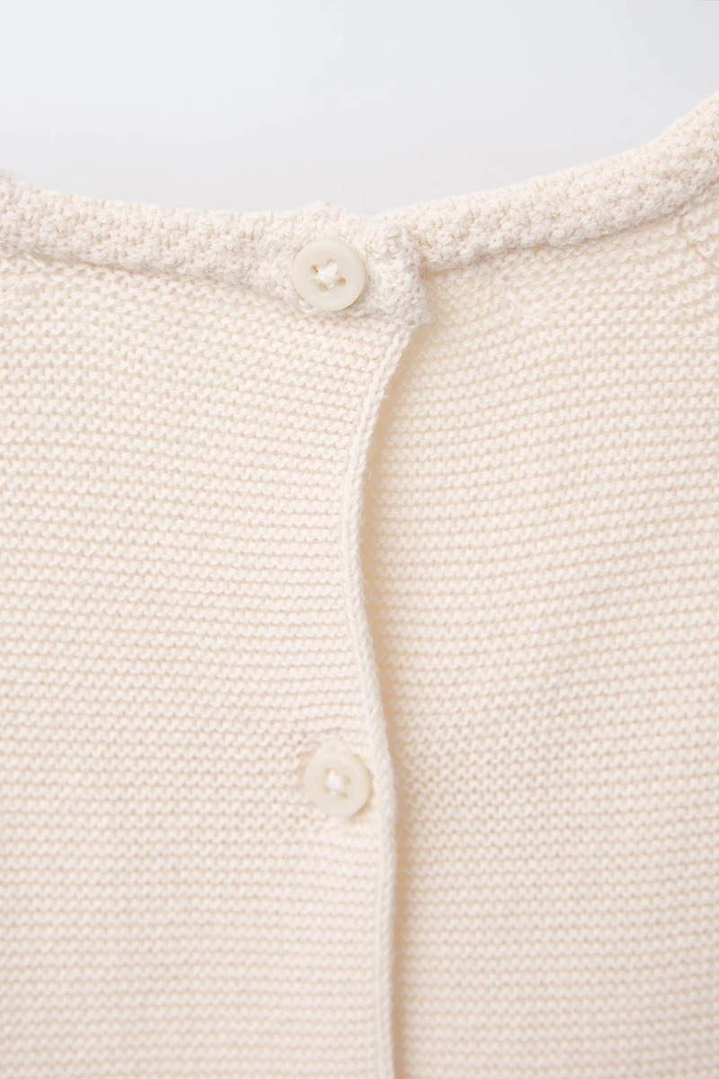 EMBROIDERED FLORAL LINKS KNIT SWEATER
