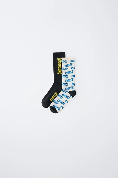 LOT DE DEUX PAIRES CHAUSSETTES MONTANTES INSCRIPTION