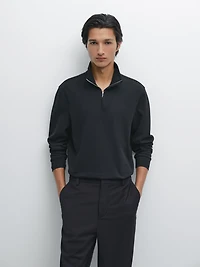 Polo à col montant zippé