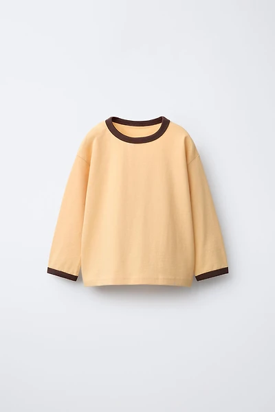 PLAIN T-SHIRT WITH CONTRASTING PIPING AT NECKLINE