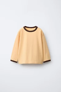PLAIN T-SHIRT WITH CONTRASTING PIPING AT NECKLINE
