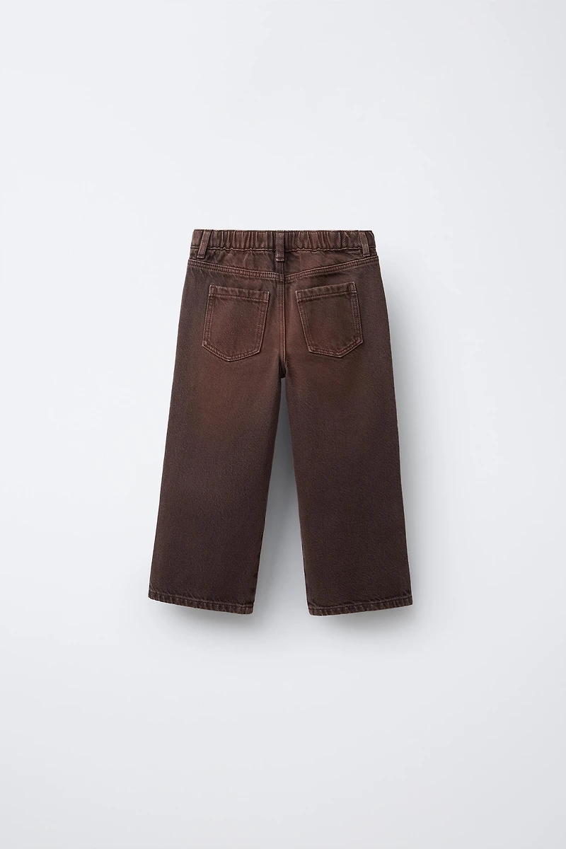CROSSOVER WAIST WIDE LEG JEANS