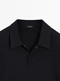 Polo à manches courtes et patte pressionnée