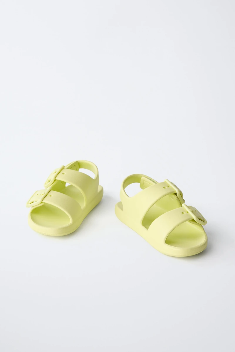 RUBBERIZED BUCKLED SANDALS