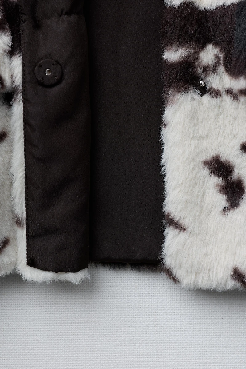BLOUSON EFFET FOURRURE IMPRIMÉ VACHE