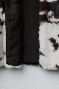 BLOUSON EFFET FOURRURE IMPRIMÉ VACHE