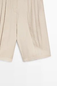 Flowing pleated Bermuda shorts - STUDIO
