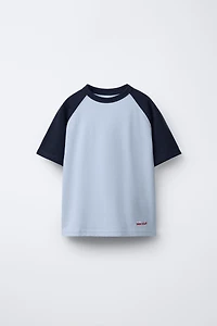 EMBROIDERED TEXT RAGLAN SLEEVE T-SHIRT