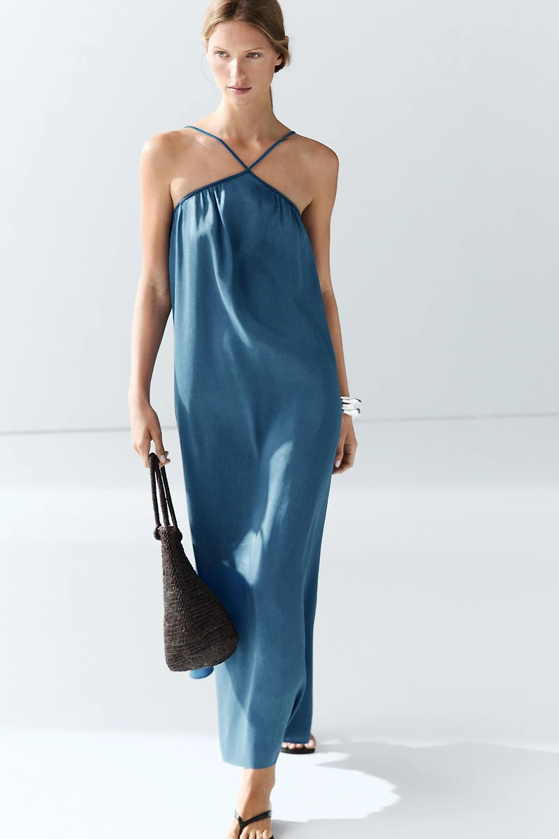 Long flowing dress with criss-cross straps