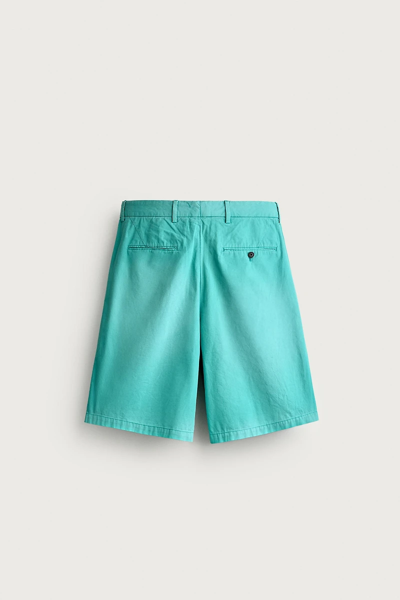 WASHED PLEATED RELAXED FIT SHORTS