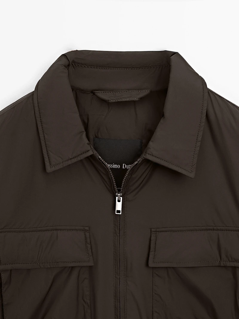 Water-repellent ultra lightweight down blend jacket